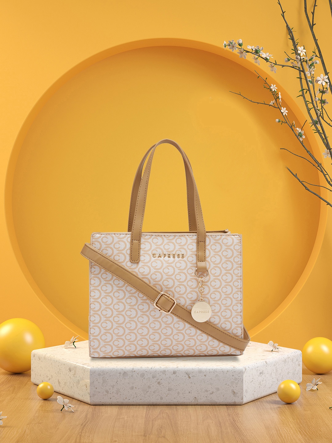 

Caprese Abstract Printed Leather Structured Handheld Bag, Beige