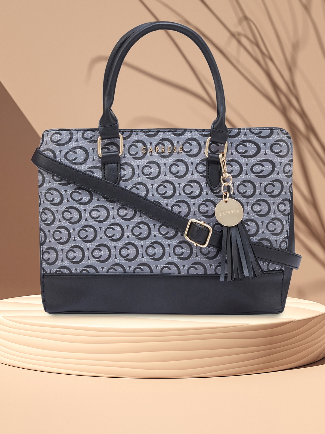 

Caprese Brand Logo Printed Leather Structured Handheld Bag, Black