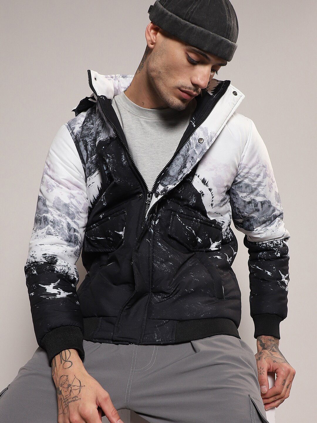 

Campus Sutra Black & Grey Abstract Printed Windcheater Puffer Jacket
