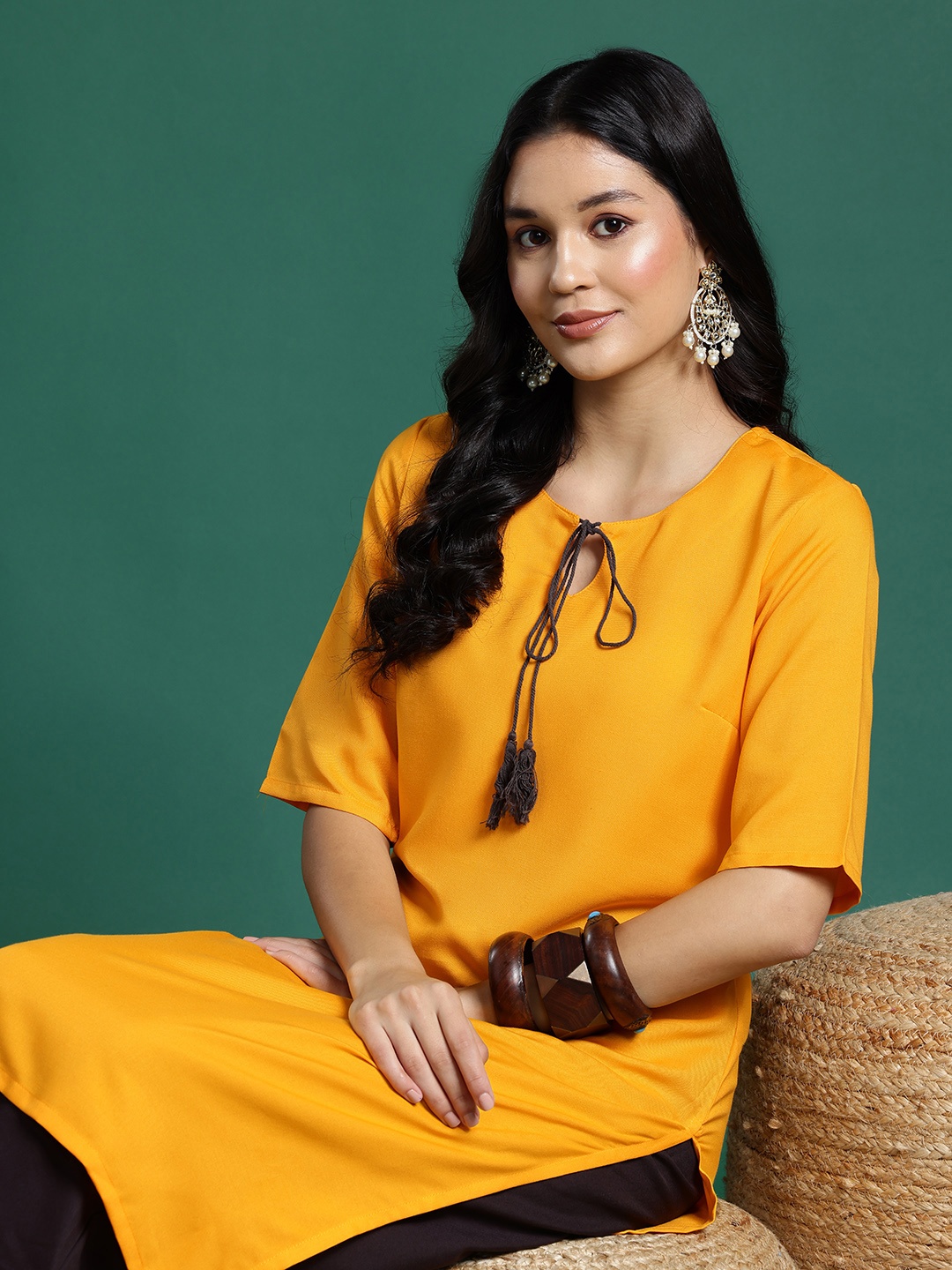 

Sangria Tie-Up Neck Kurta with Palazzos, Mustard