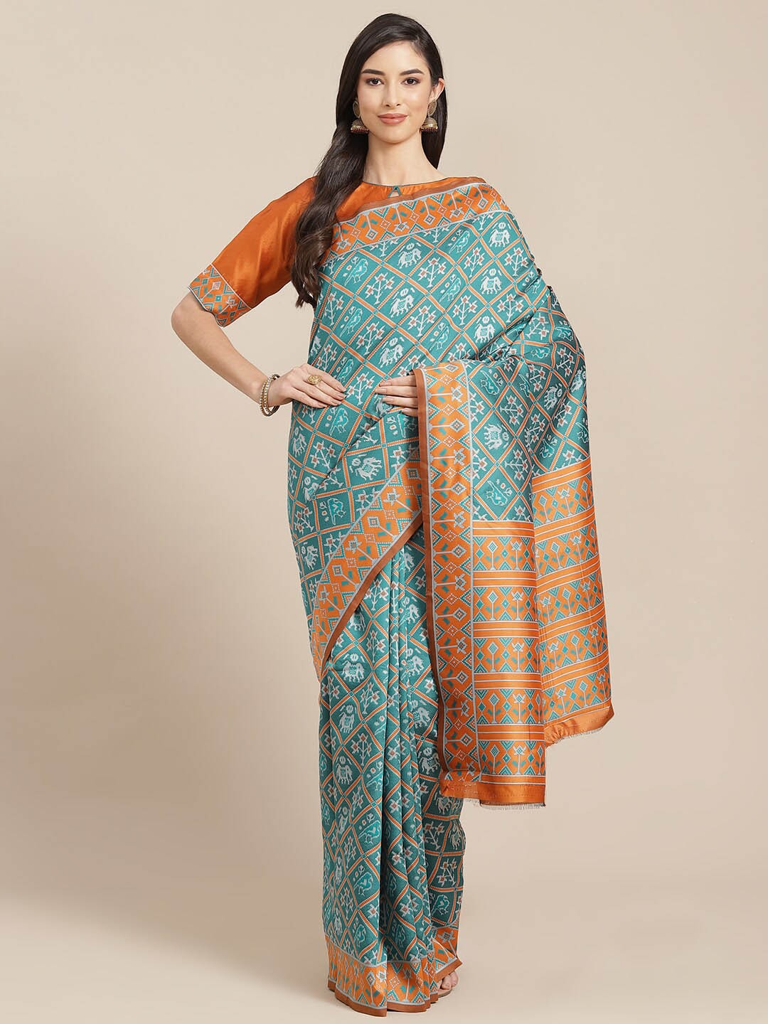 

Mitera Turquoise Blue & Orange Ethnic Motifs Printed Silk Cotton Patola Saree