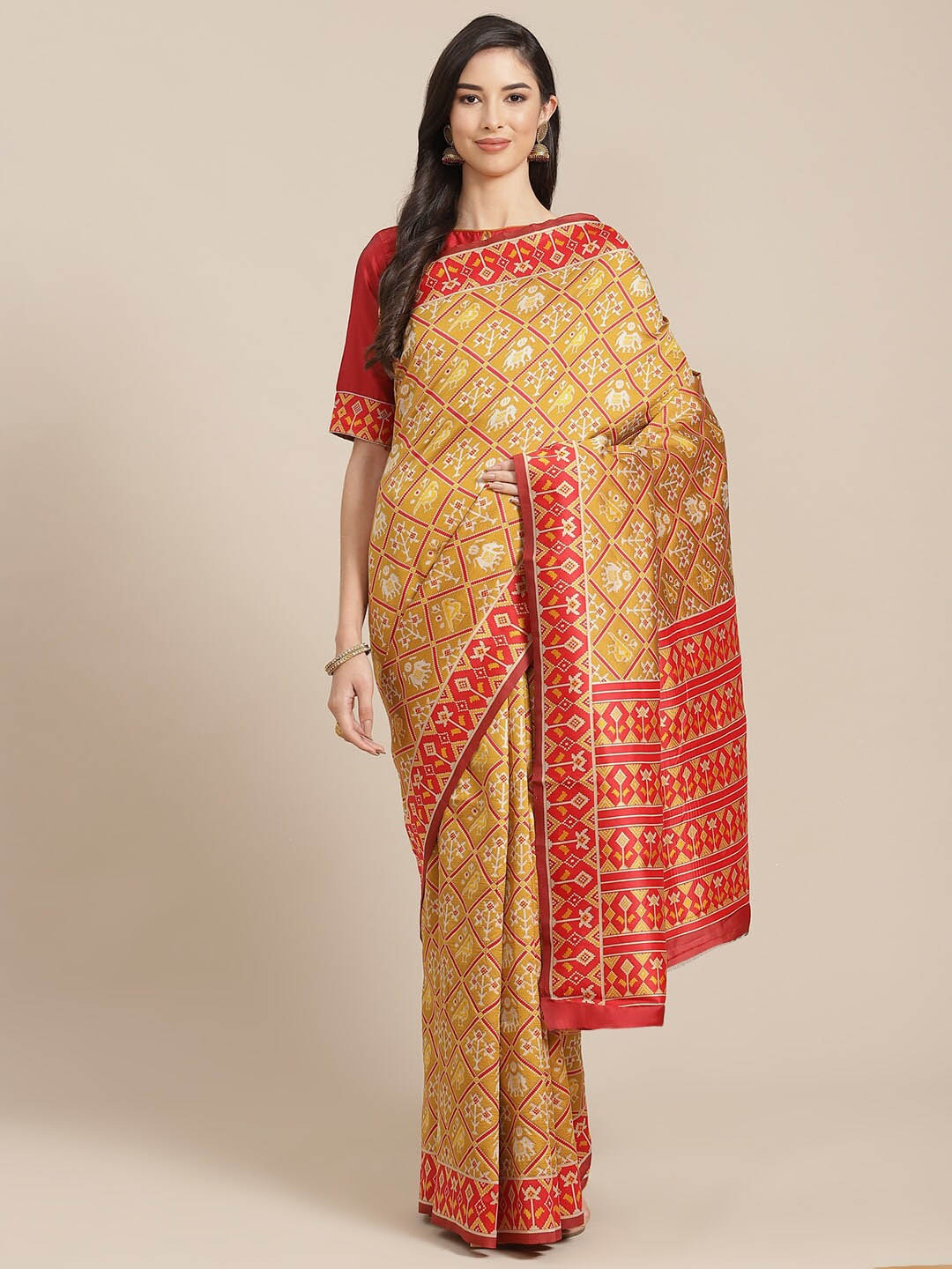 

Mitera Mustard Yellow & Red Ethnic Motifs Printed Silk Cotton Patola Saree