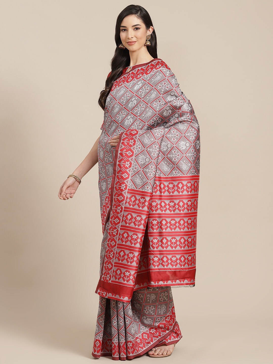 

Mitera Grey Ethnic Motifs Printed Silk Cotton Patola Saree