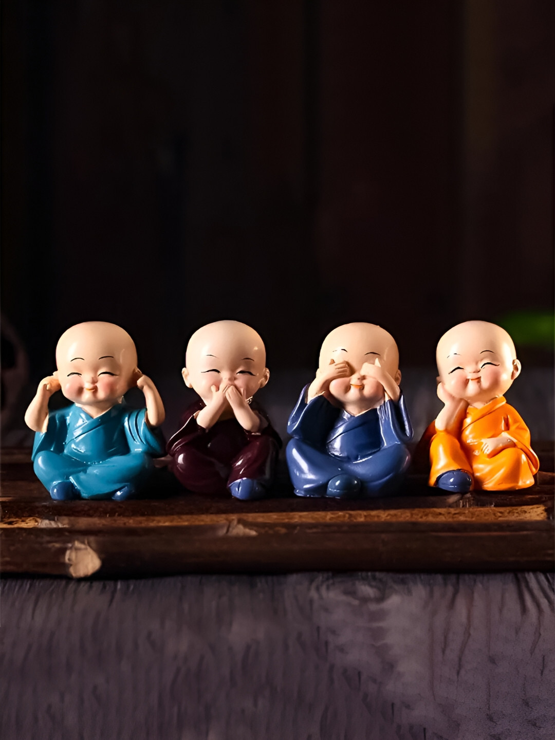 

Elegant Lifestyle Figurines Blue & Orange 4 Pieces Small Buddha Showpieces