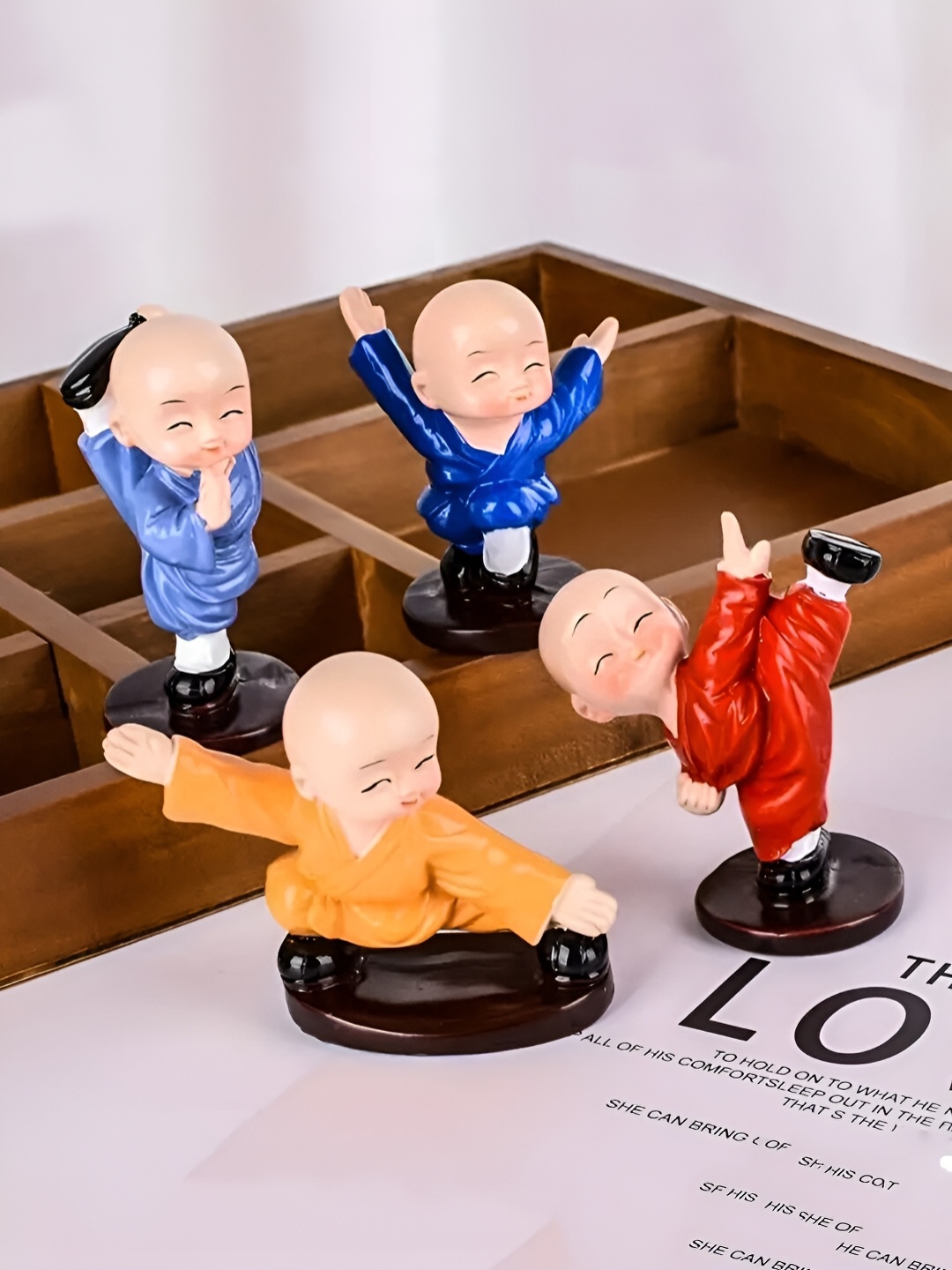 

Elegant Lifestyle Blue & Red 4 Pieces Kung-fu Buddha Figurine Showpieces