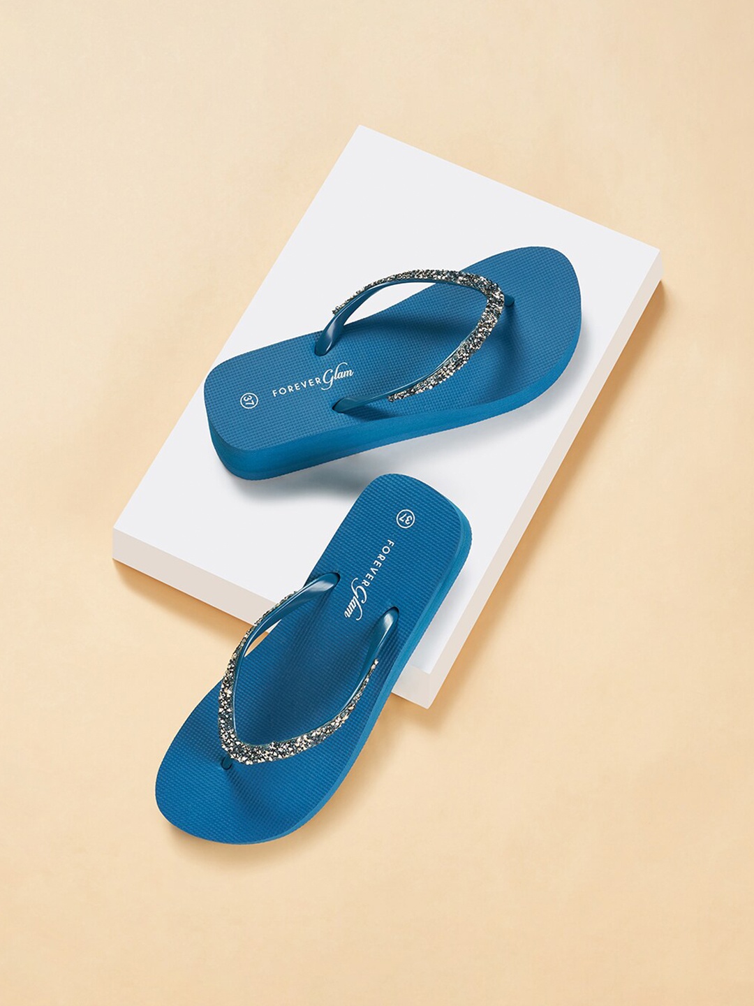 

Forever Glam by Pantaloons Women Embellished Thong Flip-Flops, Teal