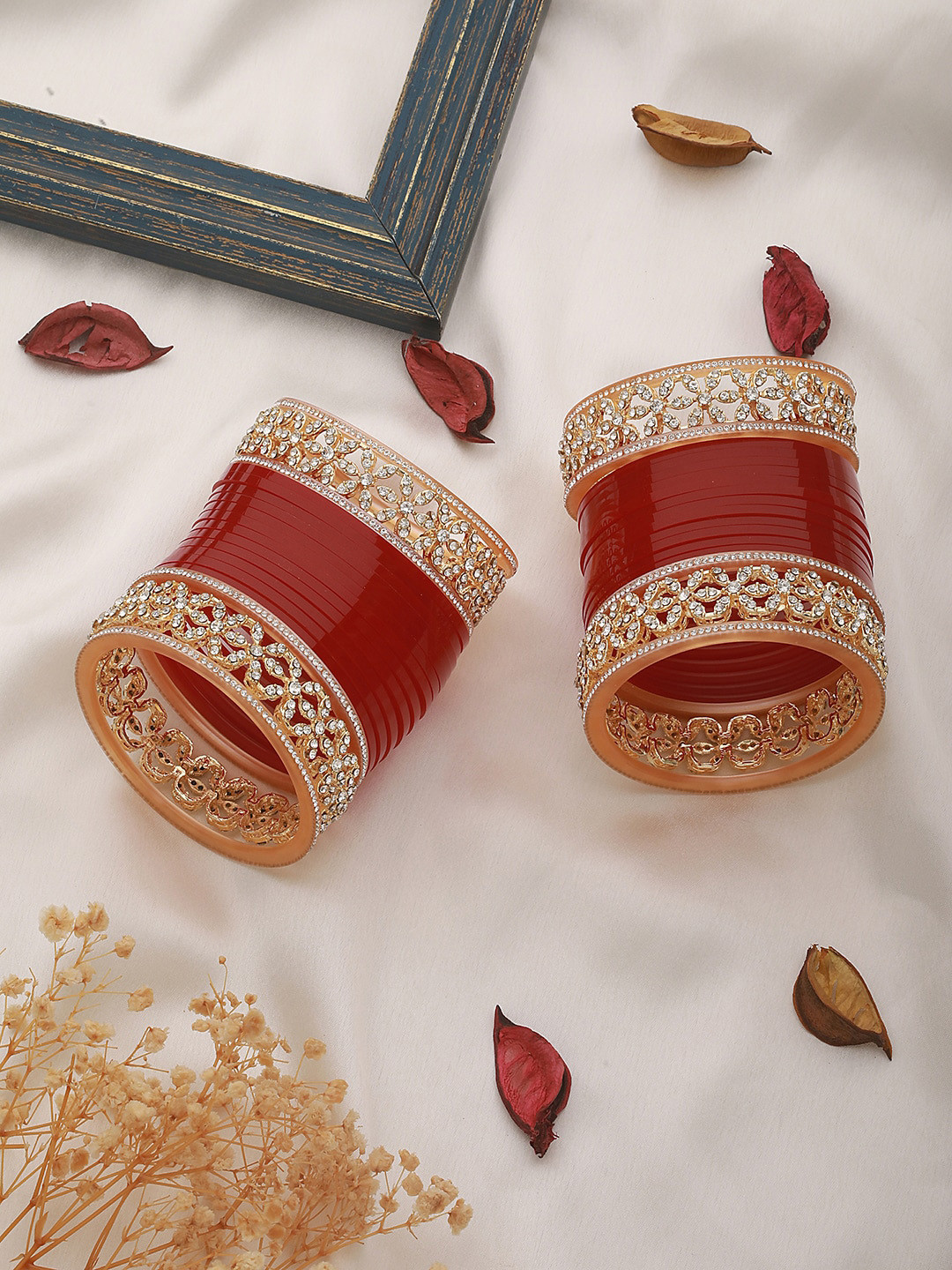 

Jazz and Sizzle Set Of 36 Gold Plated Bangles