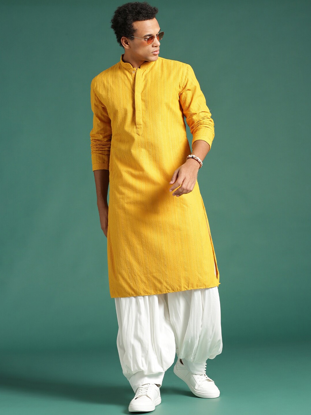

Sangria Mustard Yellow Ethnic Motifs Embroidered Mandarin Collar Chikankari Cotton Kurta