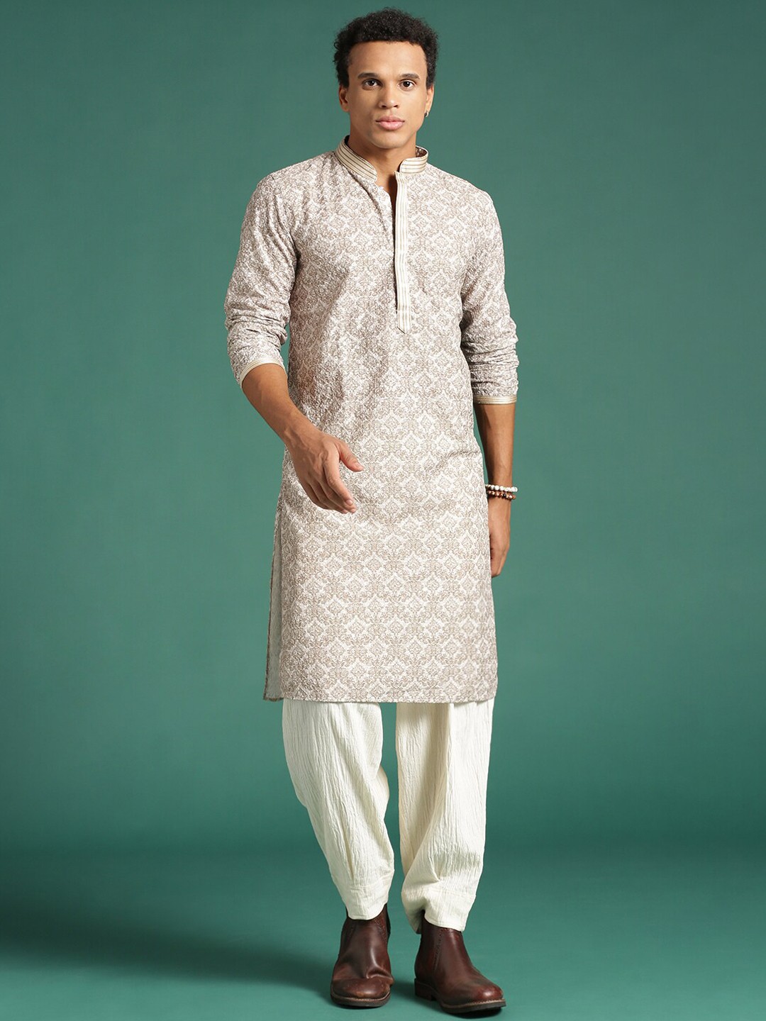 

Sangria Beige Ethnic Motifs Embroidered Sequinned Cotton Chikankari Kurta
