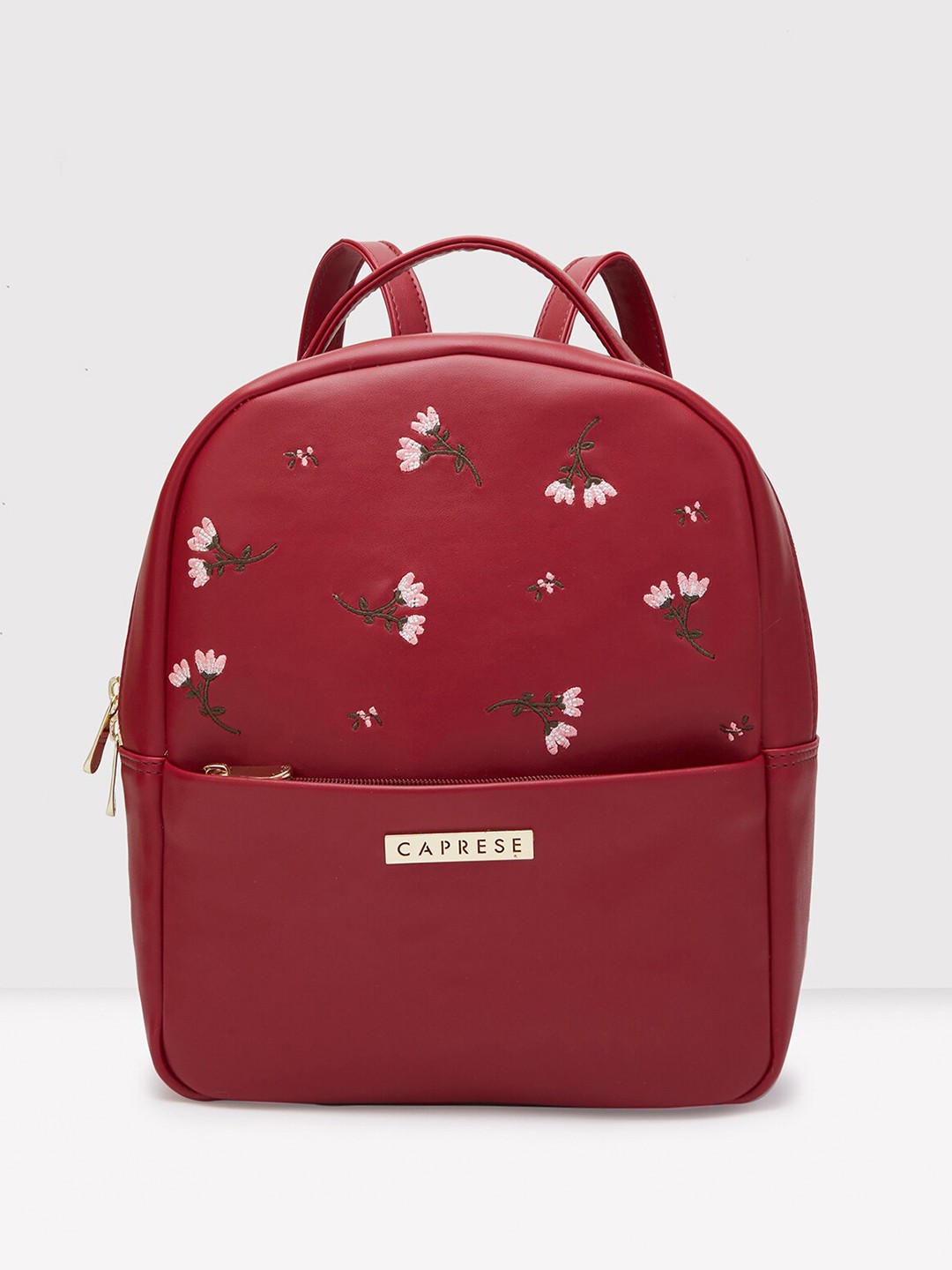 

Caprese Women Printed Leather Backpack, Maroon