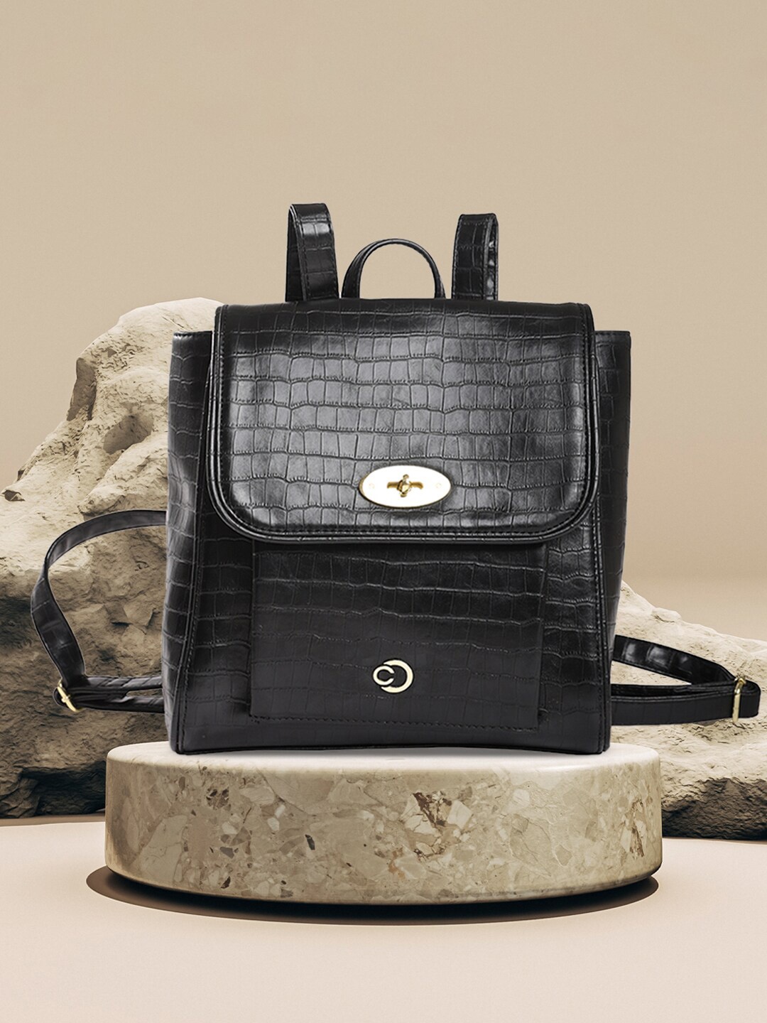 

Caprese Women Textured Leather Backpack, Black
