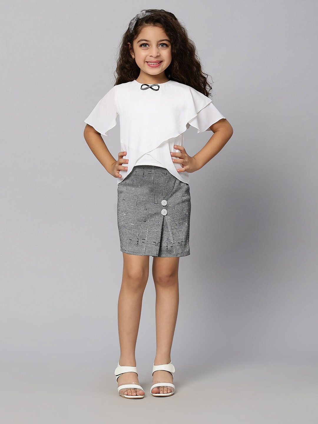 

Macwin Girls Round Neck Short Sleeves Top With Self Design Skirt, White