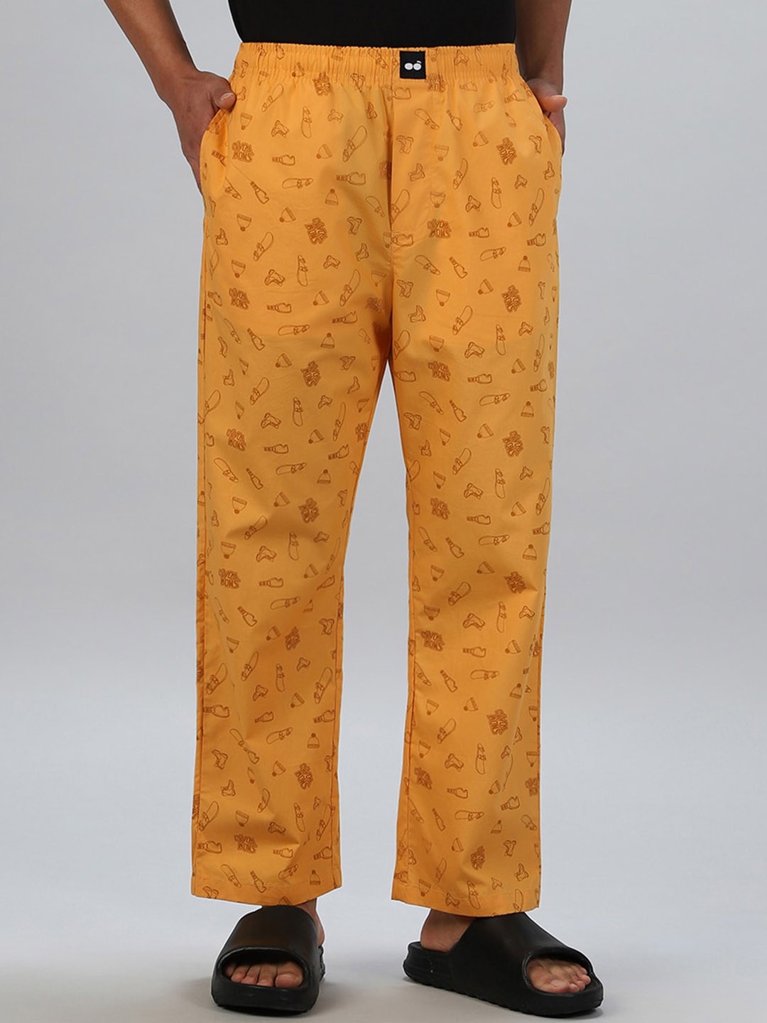 

Bewakoof Men Conversational Printed Lightweight & Silicon Wash Pure Cotton Lounge Pant, Yellow