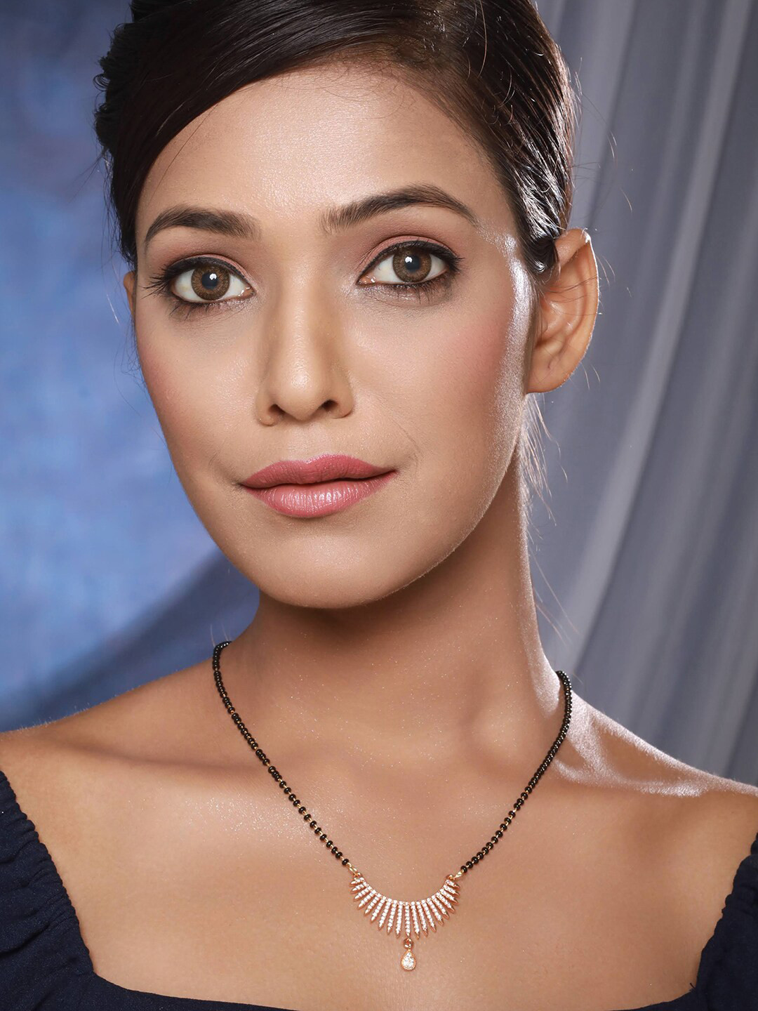 

Anouk Rose Gold Plated American Diamond Stone Studded & Beaded Mangalsutra