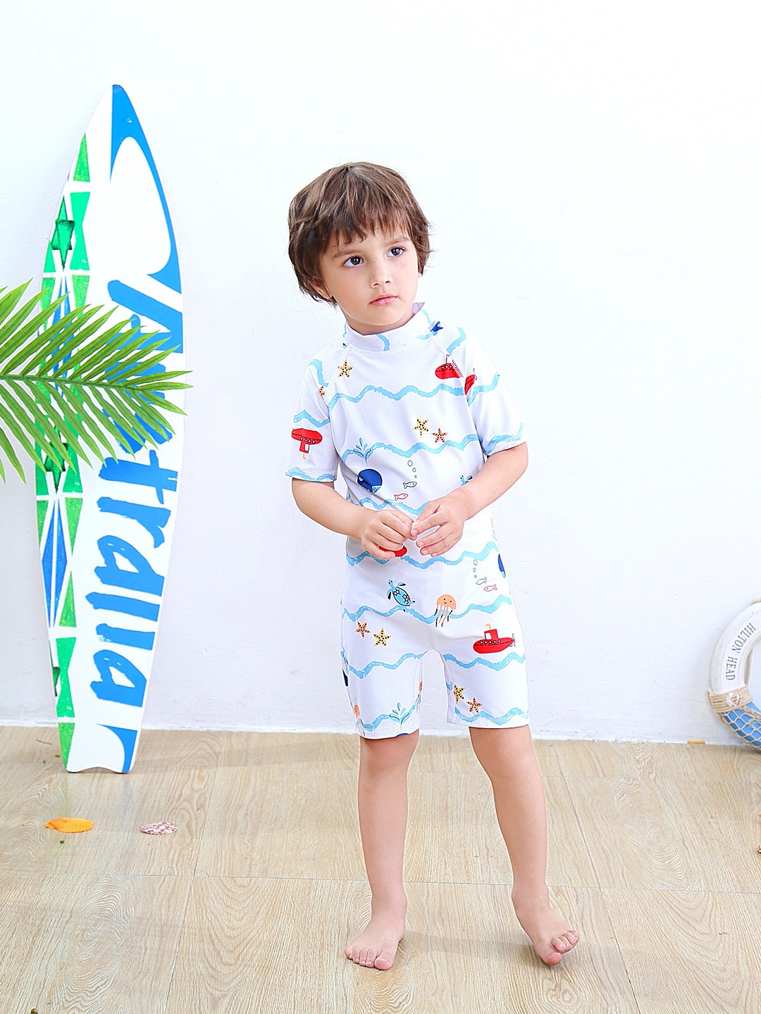 

StyleCast Boys White & Blue Animal Printed High Neck Legsuit With Cap