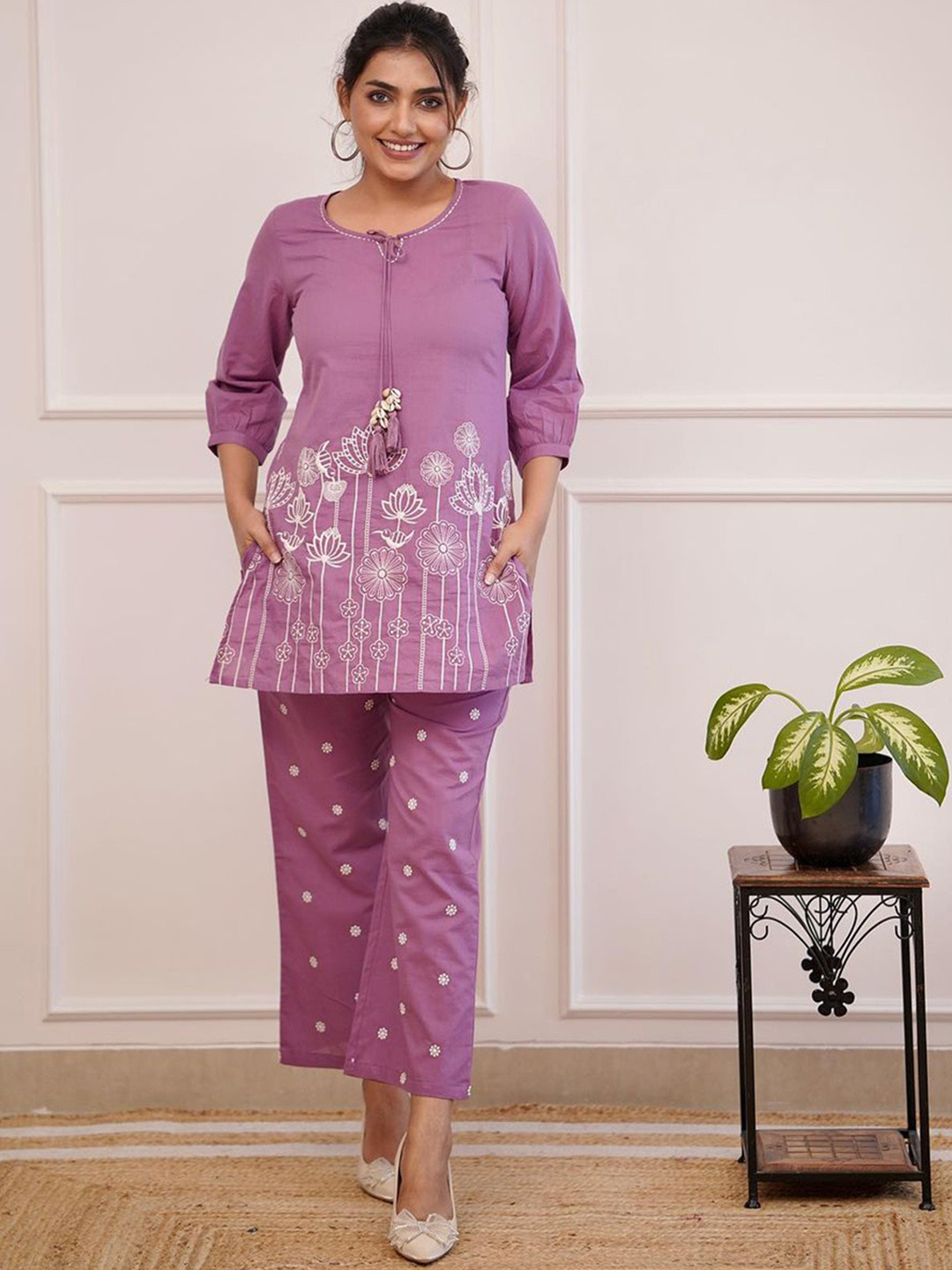 

KALINI Floral Embroidered Thread Work Tie-Up Neck Straight Kurti & Trousers, Purple