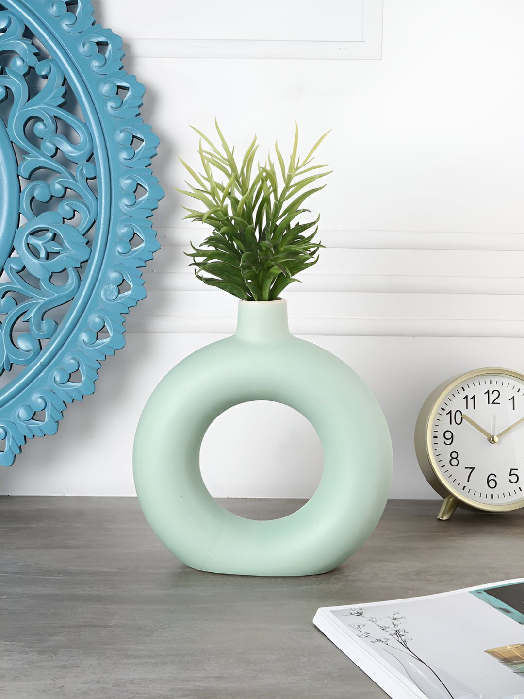 

The Decor Lane Green Solid Printed Donut Shaped Ceramic Vase