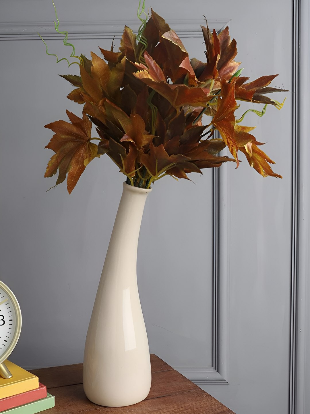 

The Decor Lane Off White Solid Curve Neck Ceramic Decorative Vase