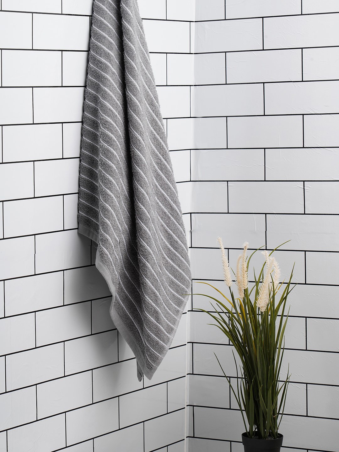 

Welspun Grey Striped 250 GSM Super Absorbent Light Weight Pure Cotton Bath Towel