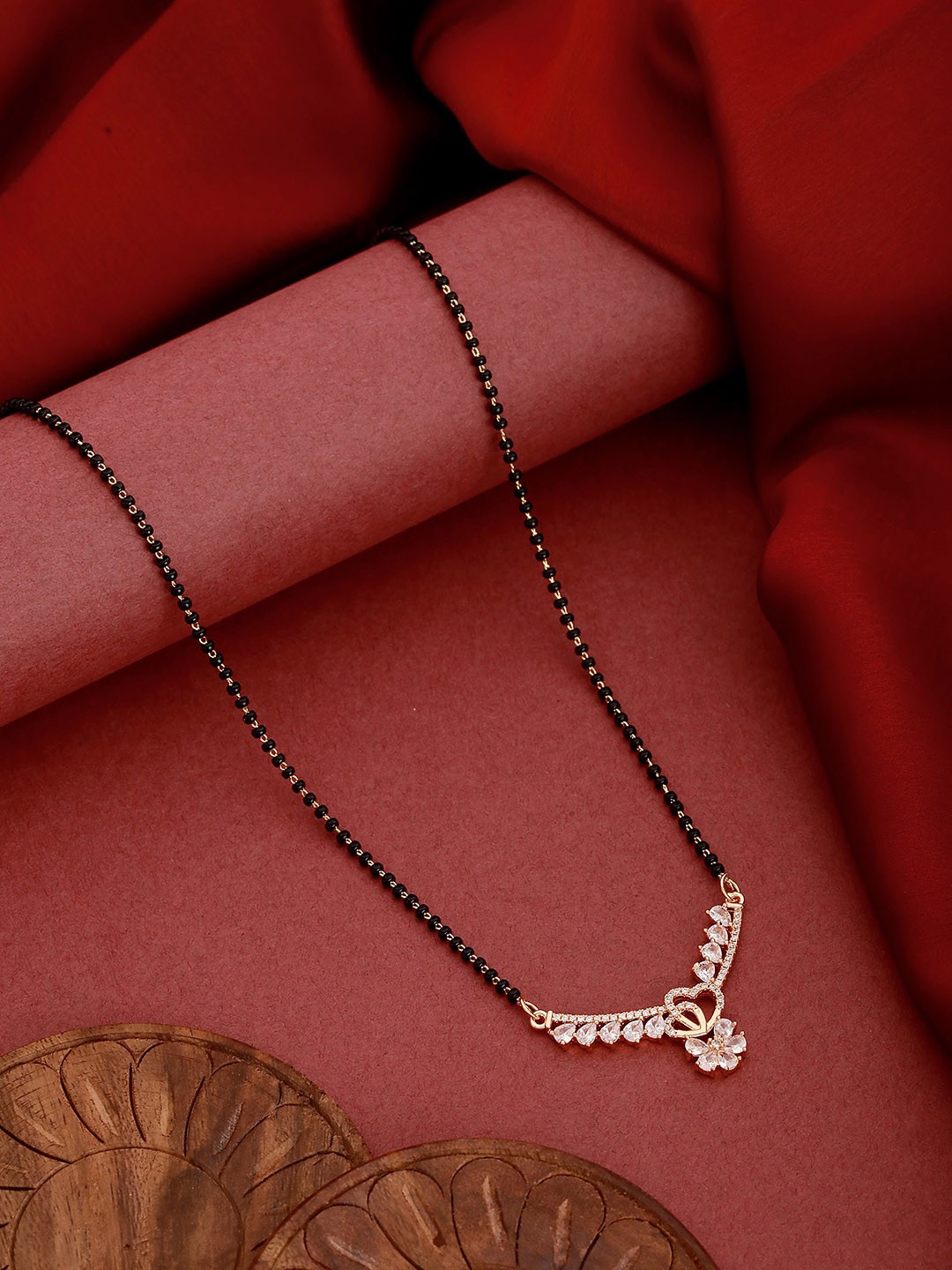 

Jazz and Sizzle Gold Plated Stone Studded & Beaded Mangalsutra