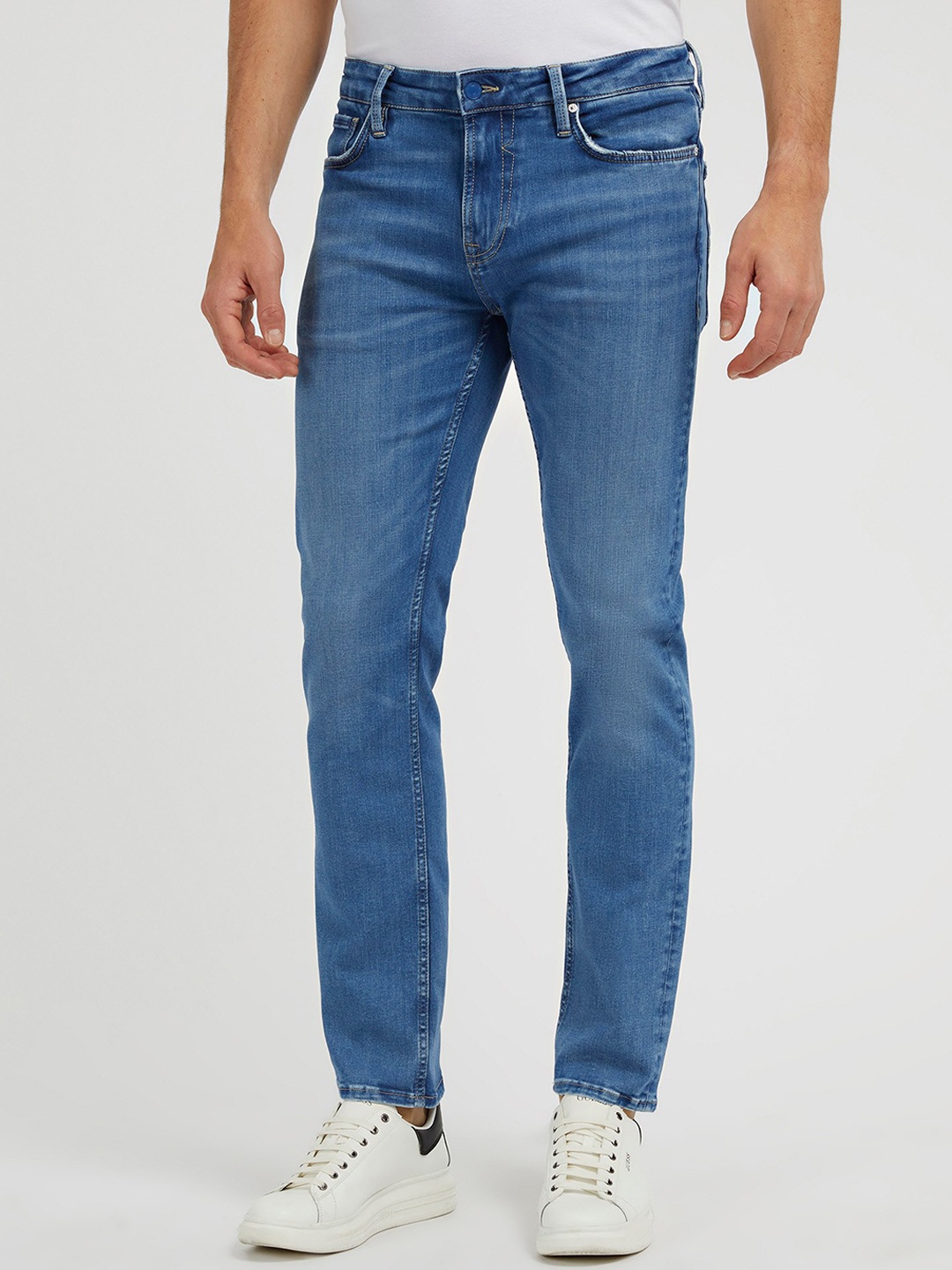 

GUESS Men Clean Look Slim Fit Low-Rise Light Fade Stretchable Jeans, Blue