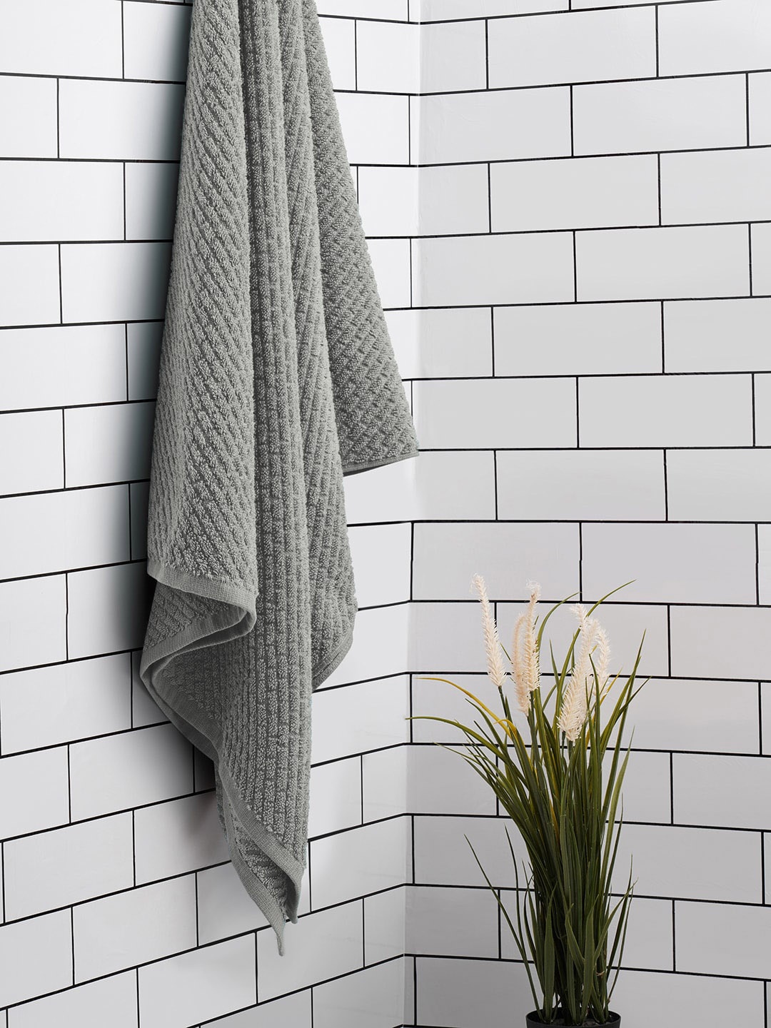 

SPACES Grey Textured Super Absorbent 400 GSM Pure Cotton Bath Towel