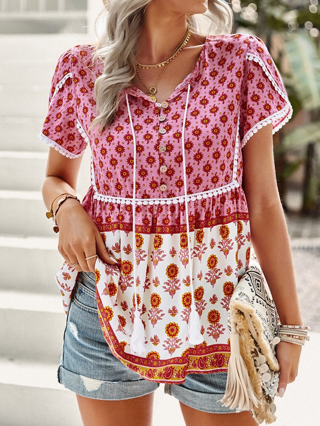 

StyleCast Pink Ethnic Motifs Printed Tie Up Neck Peplum Top