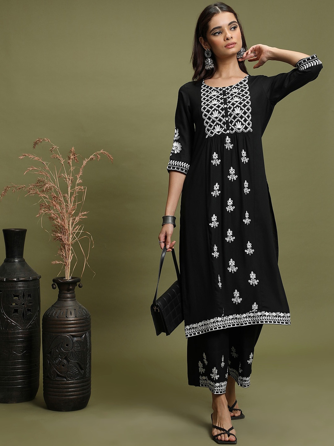 

Vishudh Black Ethnic Motifs Embroidered Regular Kurta With Palazzos