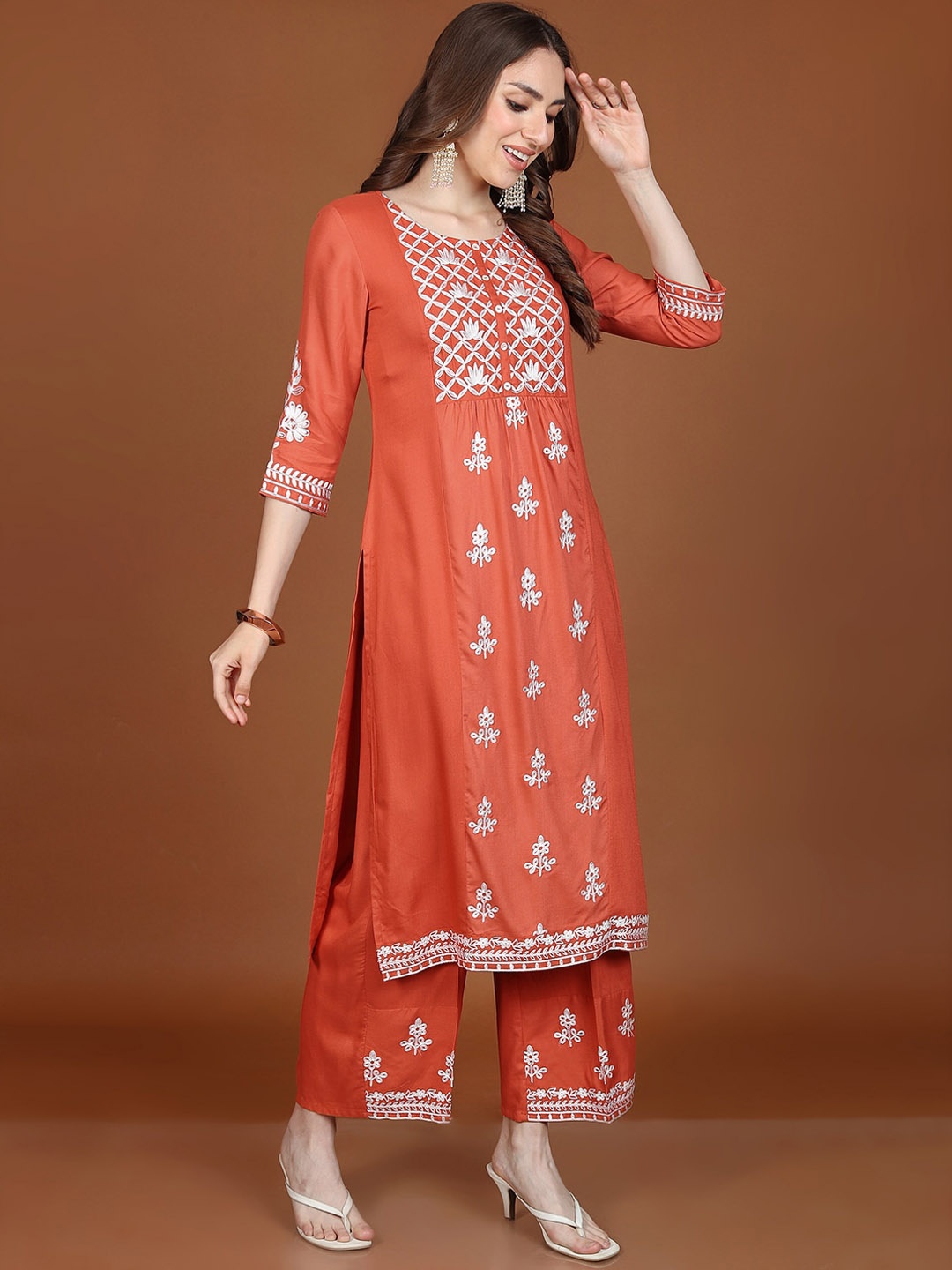 

Vishudh Orange Ethnic Motifs Embroidered Regular Kurta With Palazzos