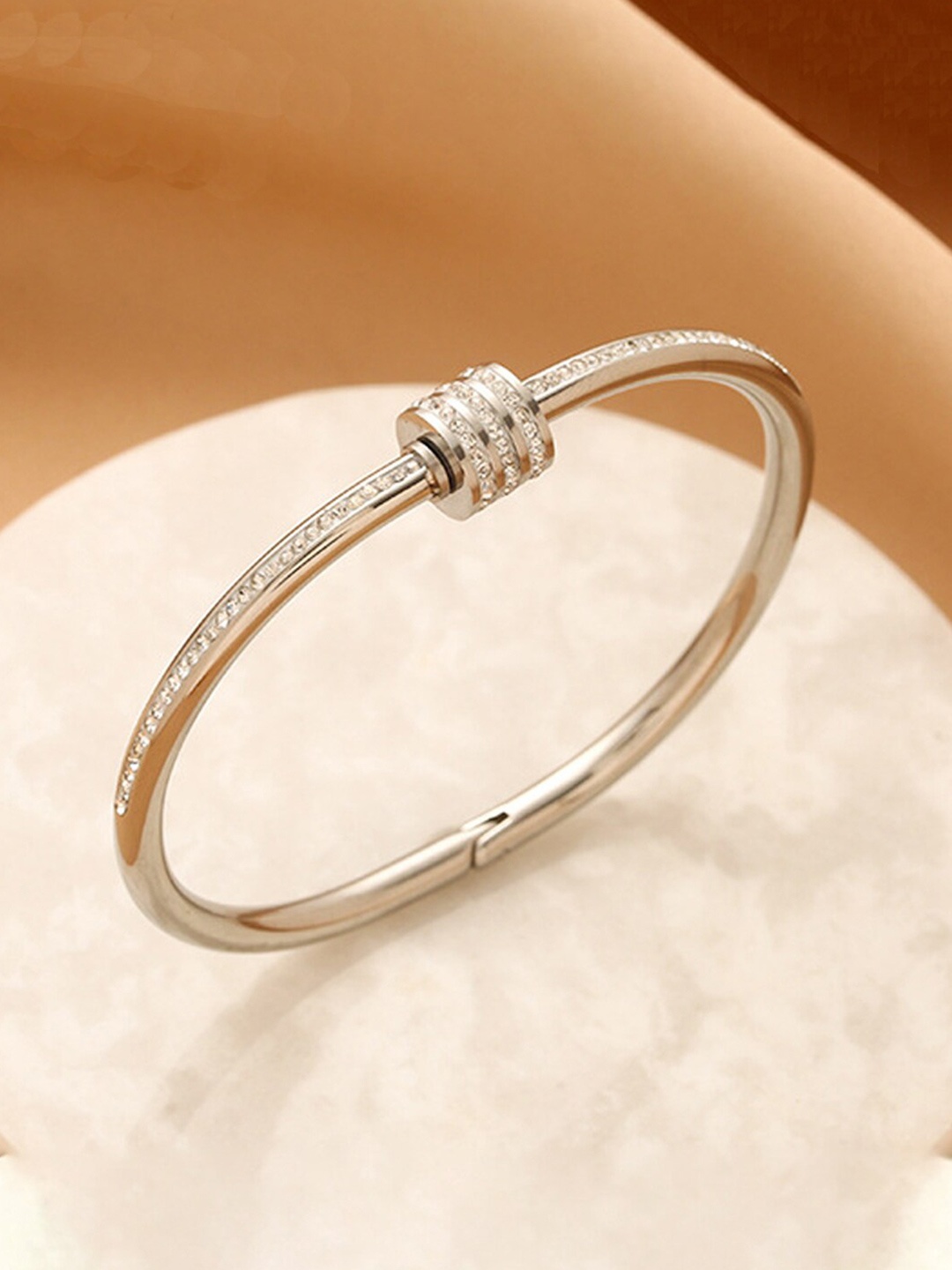 

Jewels Galaxy Women Silver-Plated AD-Studded Stainless Steel Bangle-Style Bracelet
