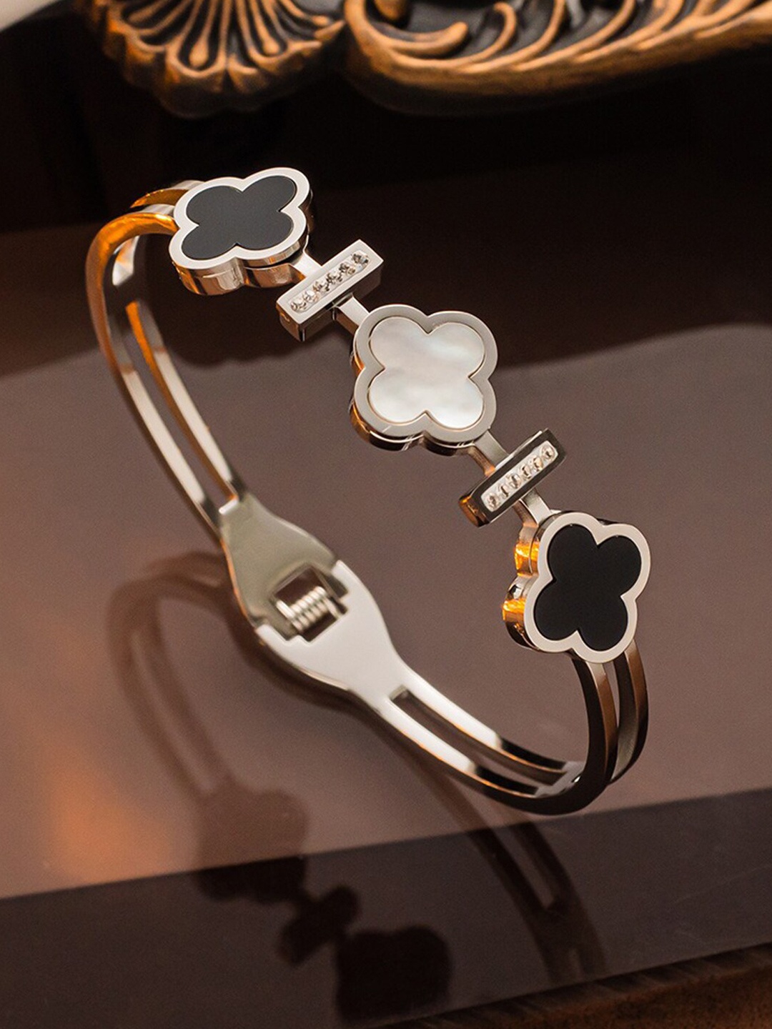

Jewels Galaxy Women Silver-Plated Stone-Studded Stainless Steel Bangle-Style Bracelet