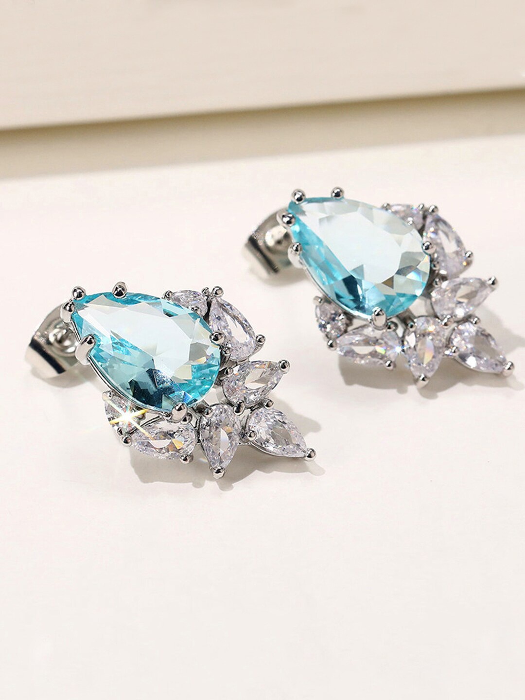 

Jewels Galaxy Silver Plated Teardrop Shaped Stud Earrings