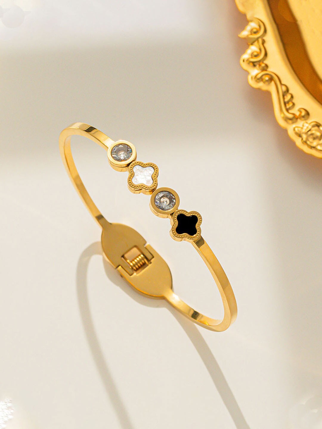 

Jewels Galaxy Gold Plated Stainless Steel Mother of Pearl Bangle Style Bracelet