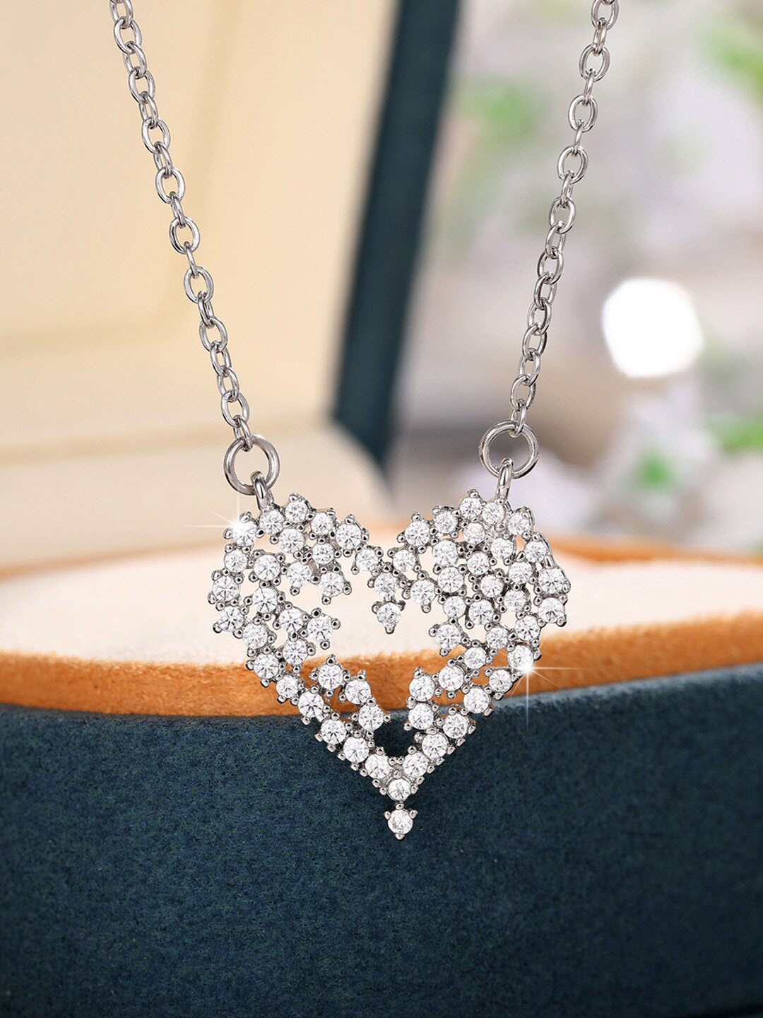 

Jewels Galaxy Silver-Plated AD-Studded Heart Pendant With Chain