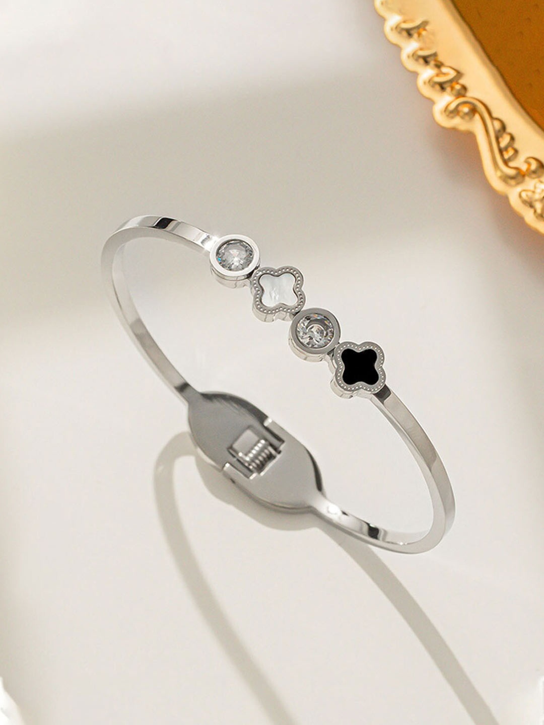 

Jewels Galaxy Silver Plated Stainless Steel Mother of Pearl Bangle Style Bracelet