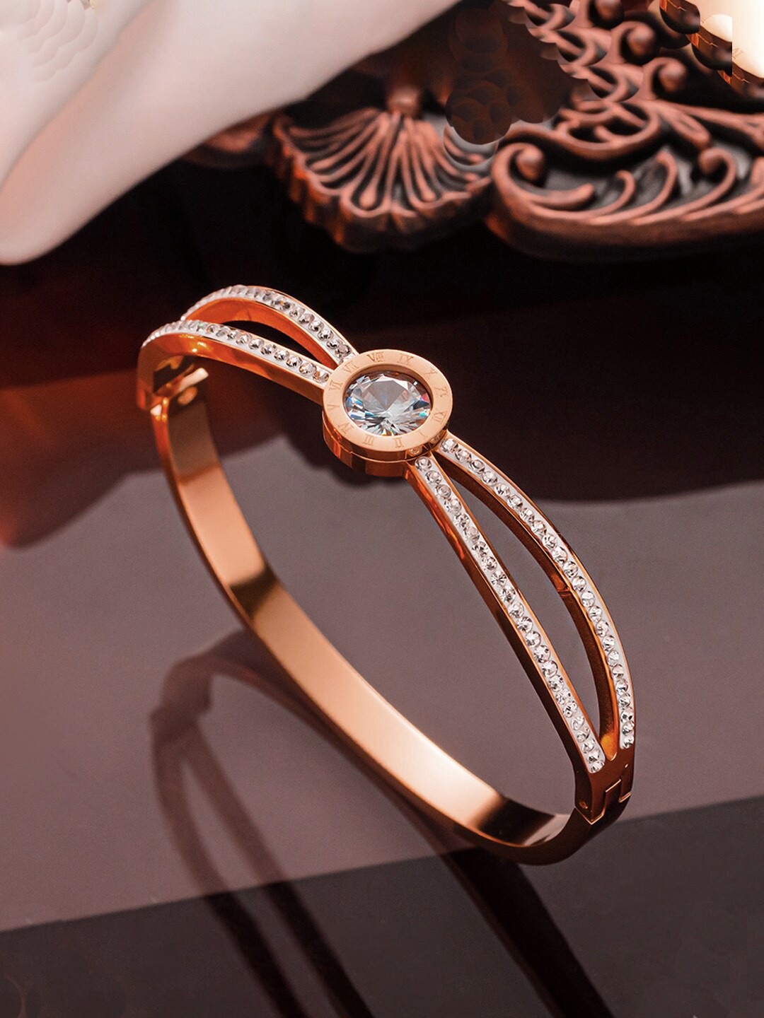 

Jewels Galaxy Rose Gold Plated AD Studded Stainless Steel Bangle Style Bracelet