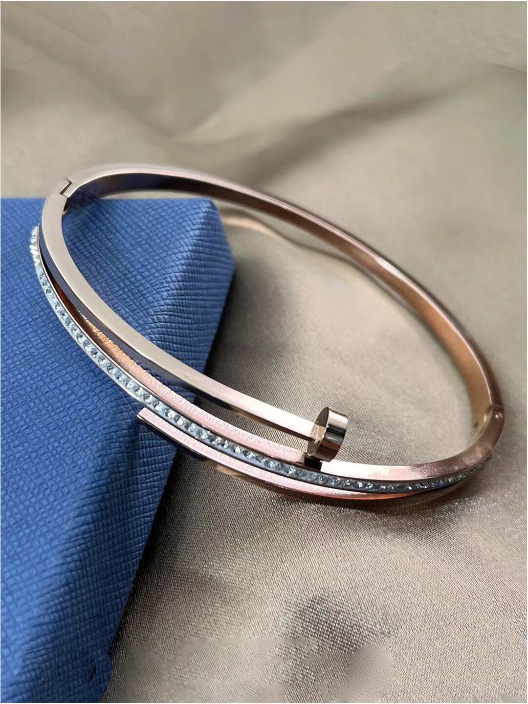 

Jewels Galaxy Rose Gold-Plated American Diamond Studded Bangle-Style Bracelet