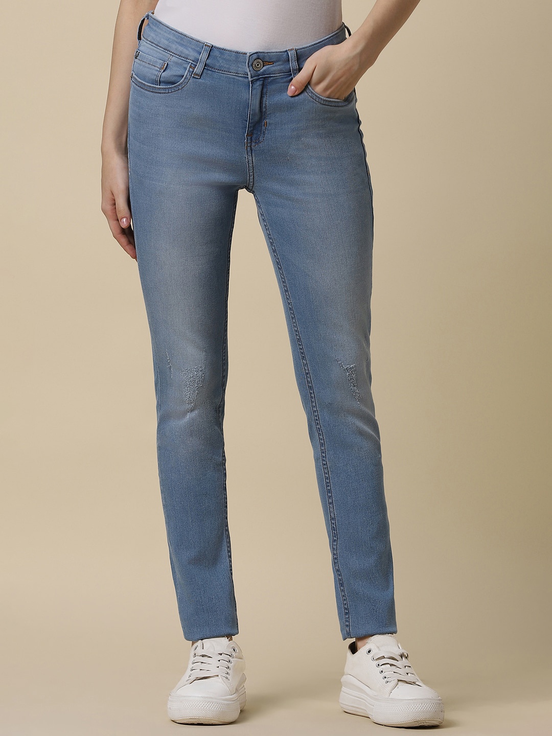 

Allen Solly Woman Mildly Distressed Mid Rise Cotton Slim Fit Jeans, Blue