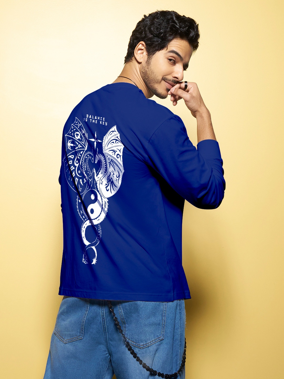 

Bewakoof Blue Seek Balance Graphic Printed Drop-Shoulder Sleeves Oversized Cotton T-shirt