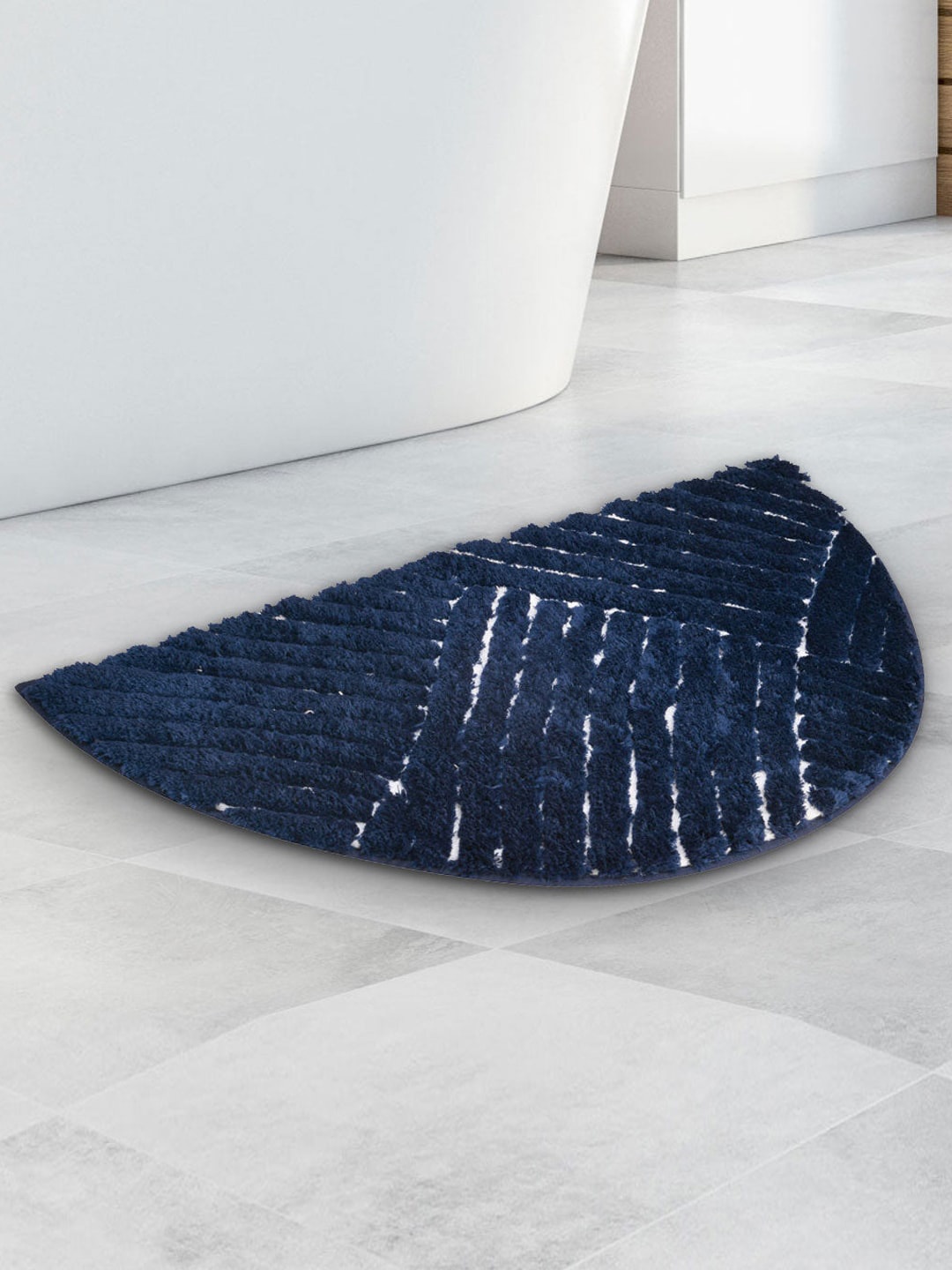 

Athome by Nilkamal Navy Blue Abstract 600 GSM D-Shaped Anti-Skid Bath Mat