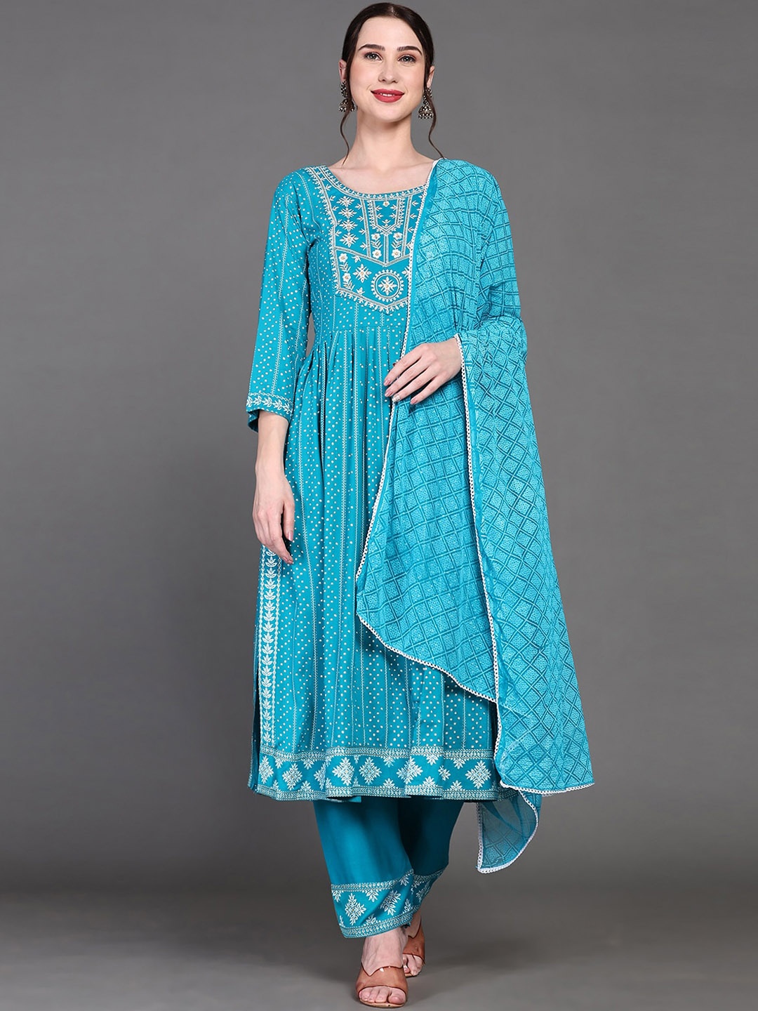 

Ziva Fashion Ethnic Motifs Printed High Slit Thread Work Kurta with Trousers & Dupatta, Blue