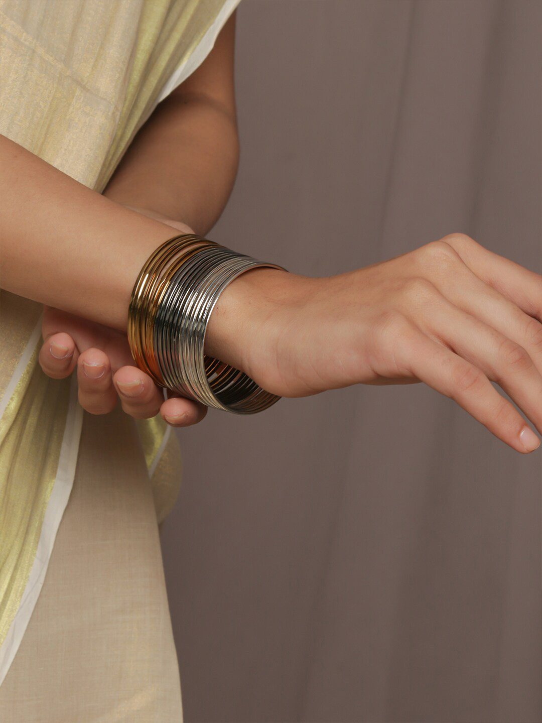 

Fida Set Of 18 Gold-Plated Metallic-Plated Bangles