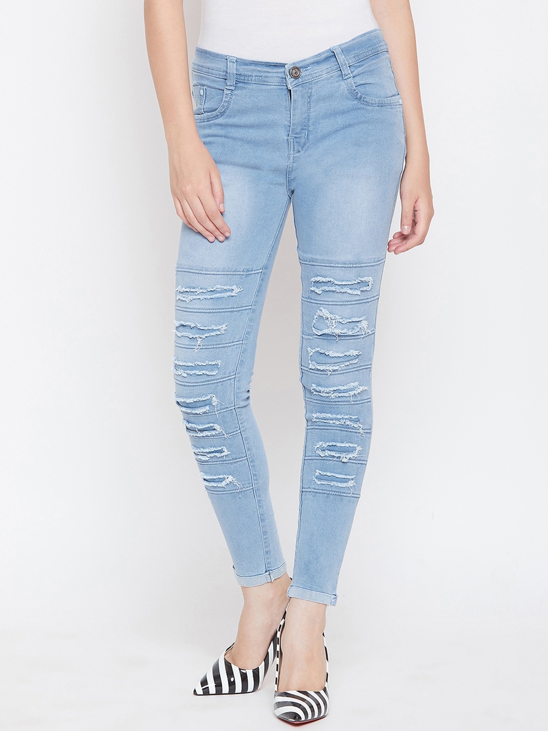 

Nifty Women Skinny Fit Highly Distressed Light Fade Stretchable Jeans, Blue