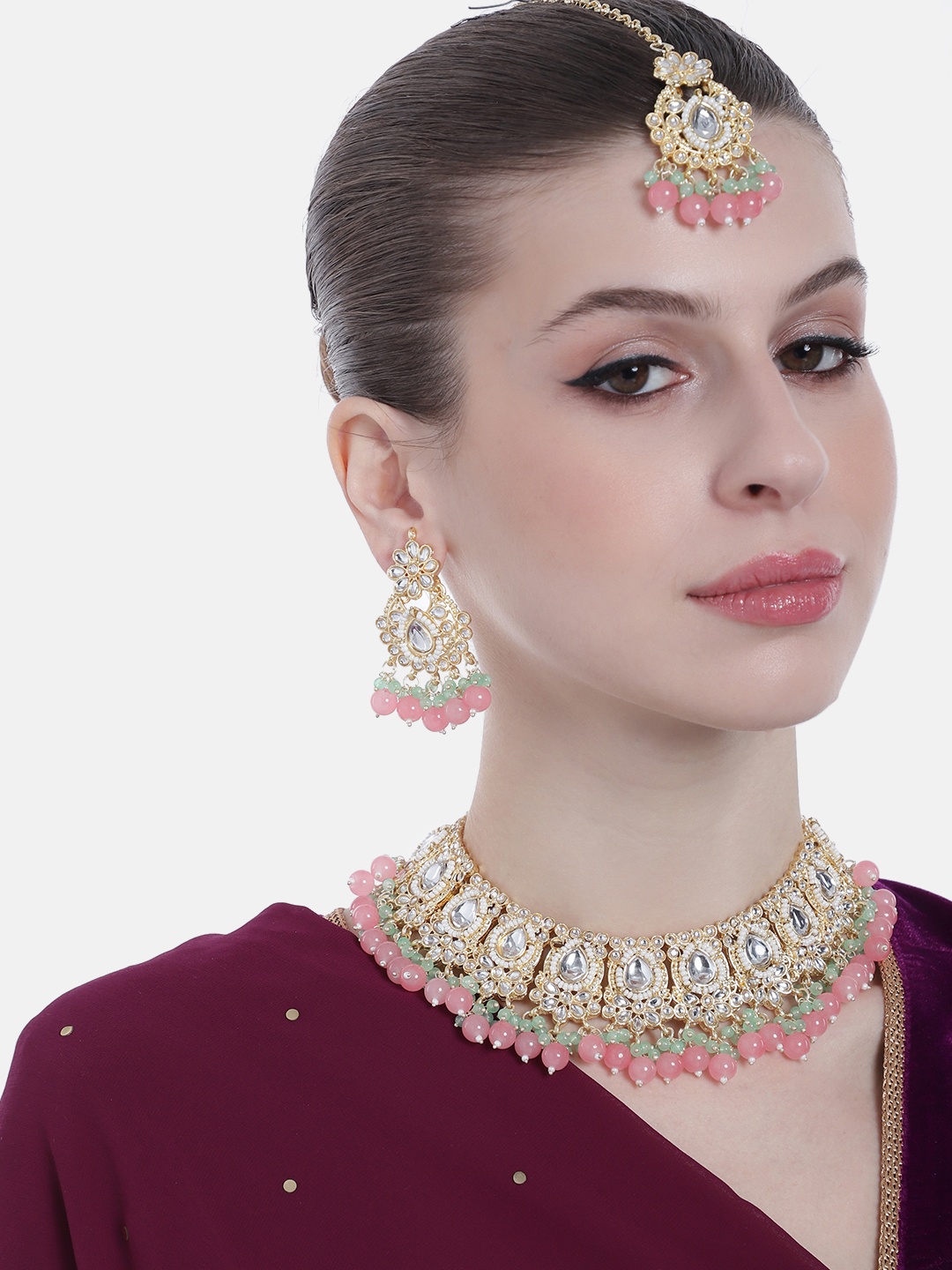 

Estele Women Gold-Plated Kundan Studded & Beaded Jewellery Set