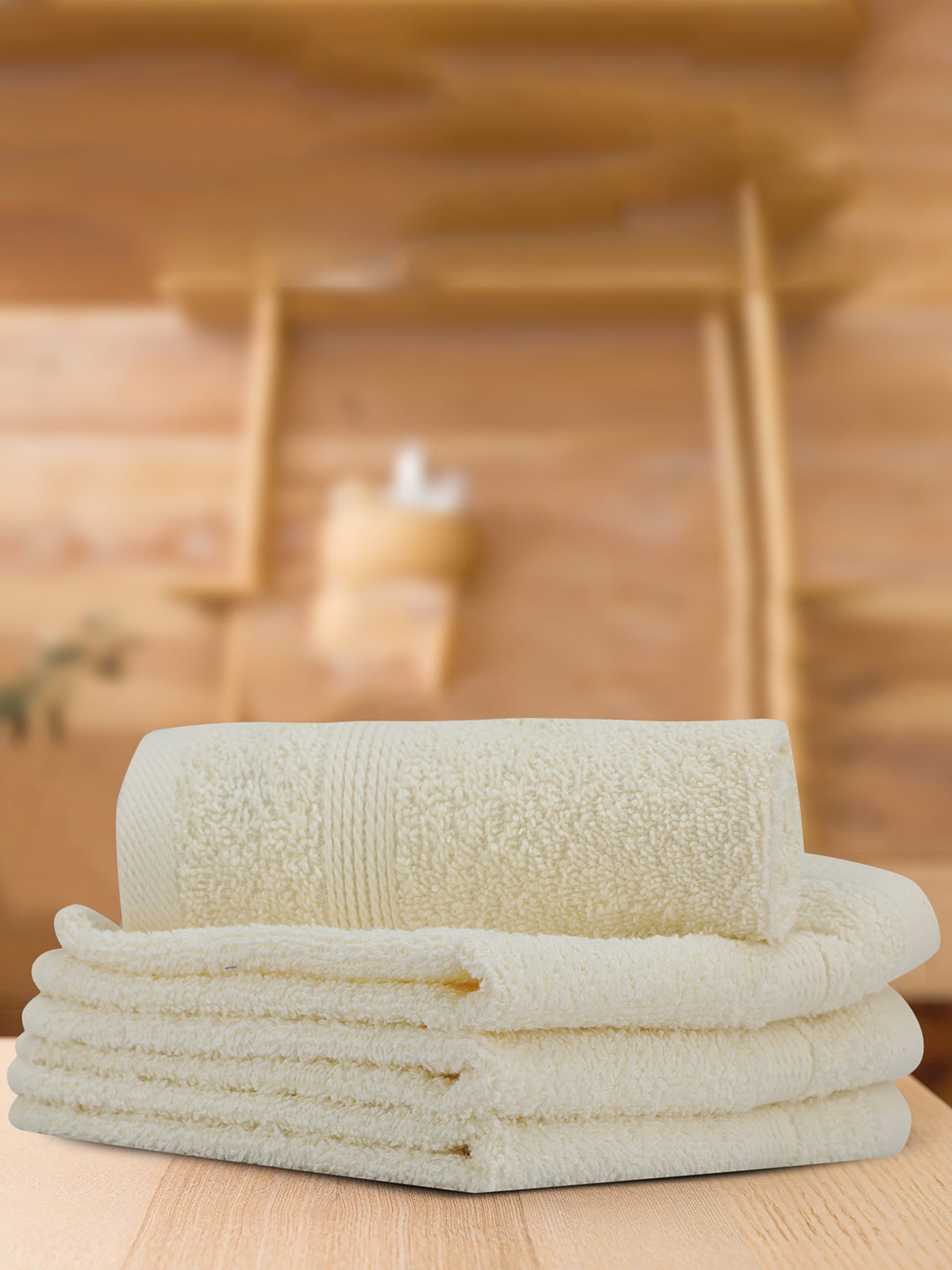 

LUSH & BEYOND Cream-coloured 4 Pieces Cotton 500 GSM Solid Face Towel Set