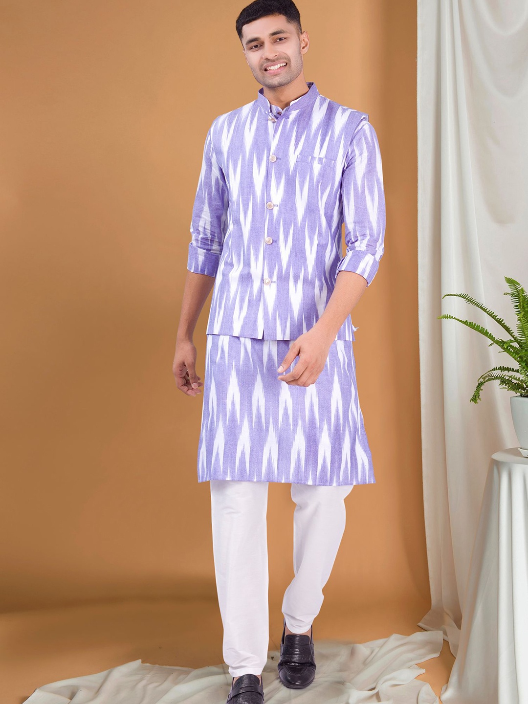 

SHIWAM ETHNIX Ikat Printed Cotton Regular Kurta with Pyjamas & Nehru jacket, Purple