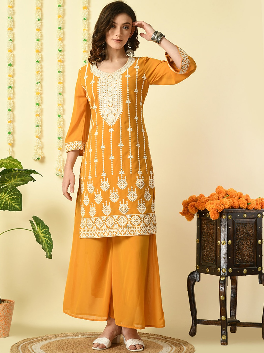 

Myshka Ethnic Motifs Embroidered Thread Work Georgette Kurta With Palazzos & Dupatta, Mustard