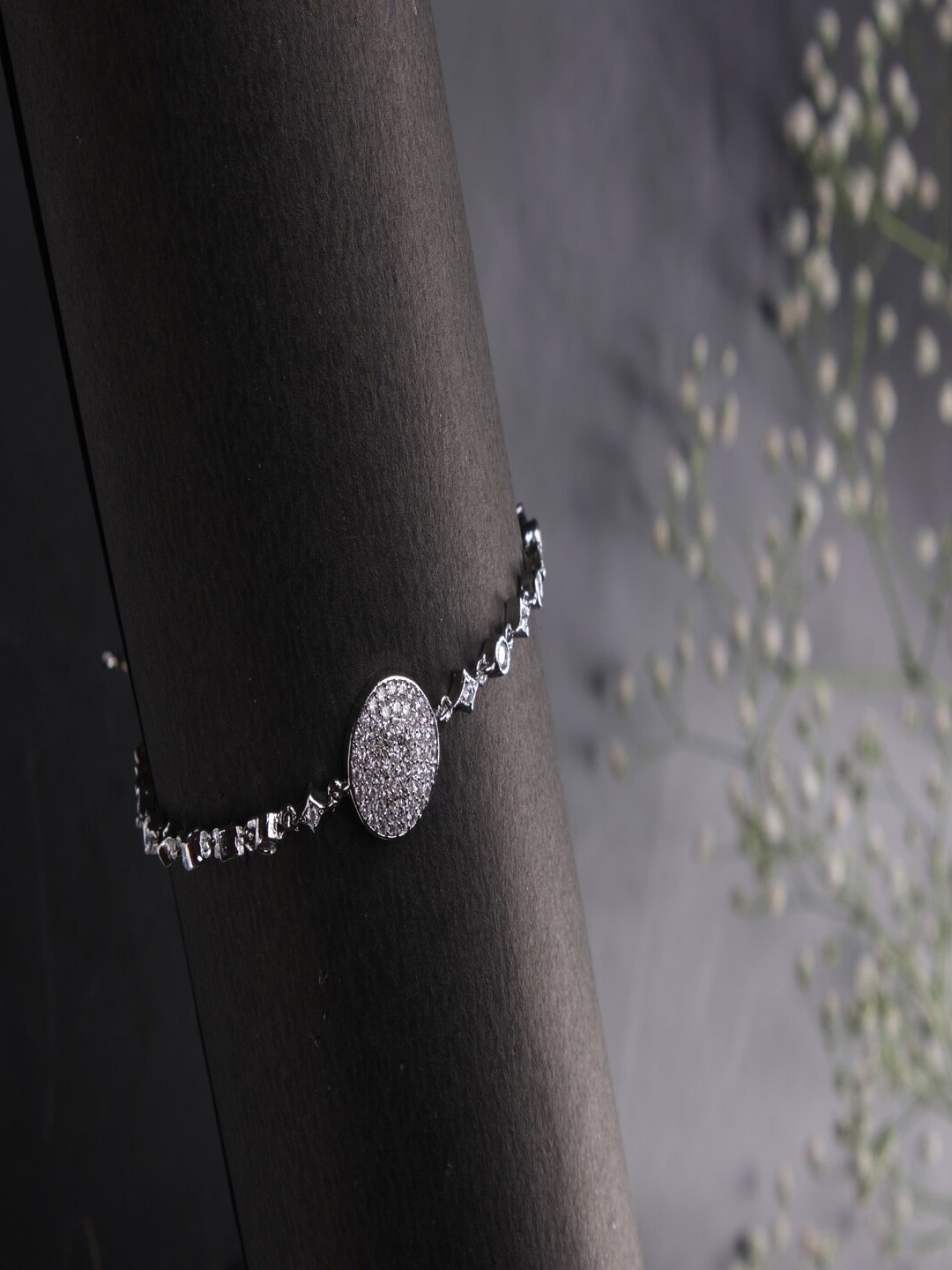 

Jewelz Silver-Plated American Diamond Stone Studded Link Bracelet