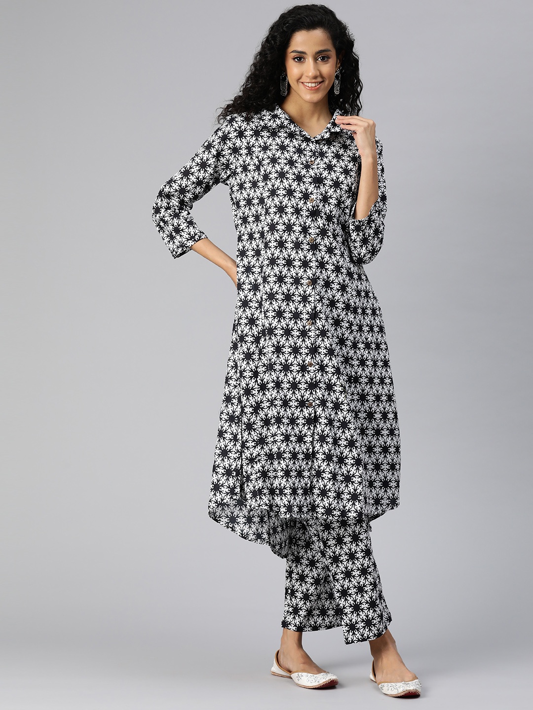 

Readiprint Women Ethnic Motifs Printed A-Line Pure Cotton Kurta with Palazzos, Black