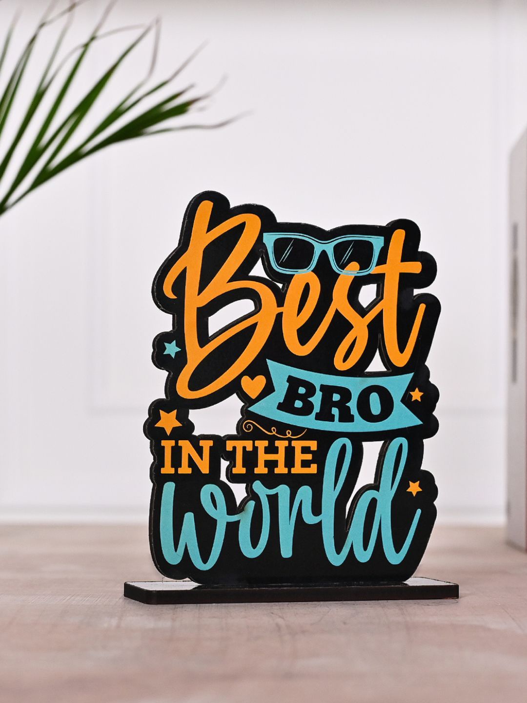 

DecorTwist Orange & Blue Quote Printed Wooden Table Decor Showpiece